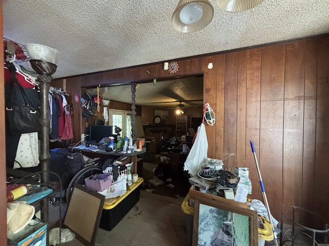 9105 Sunset Ln, Little Rock, AR 72209 - misc room featuring wood walls, a textured ceiling, and a ceiling fan