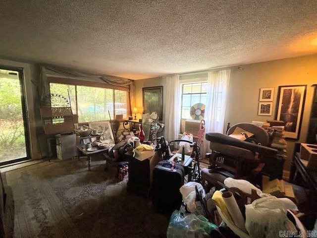 9105 Sunset Ln, Little Rock, AR 72209 - living room with a textured ceiling and plenty of natural light