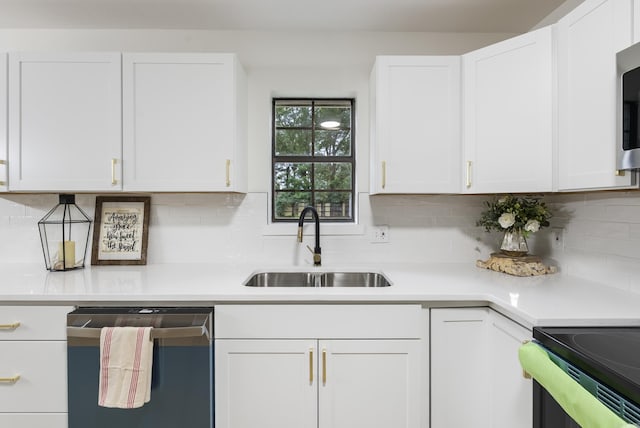 1495 Manor St, Conway, AR 72034 - kitchen featuring stainless steel appliances, light countertops, and white cabinets