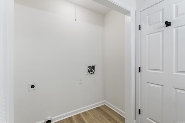 1495 Manor St, Conway, AR 72034 - washroom featuring electric dryer hookup and light wood finished floors