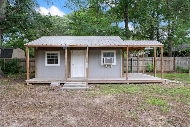 1495 Manor St, Conway, AR 72034 - view of outdoor structure with a fenced backyard