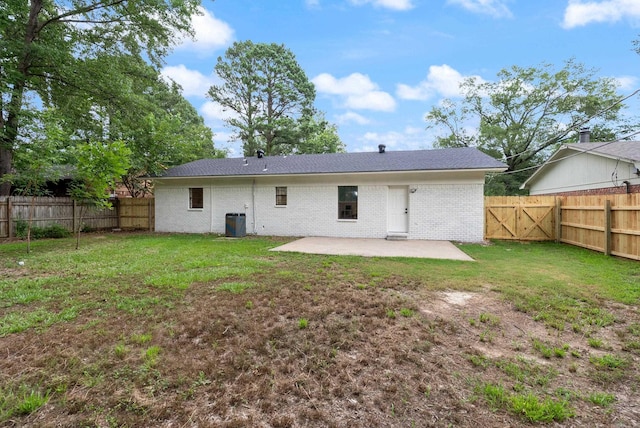1495 Manor St, Conway, AR 72034 - rear view of property featuring a patio area, a fenced backyard, and brick siding