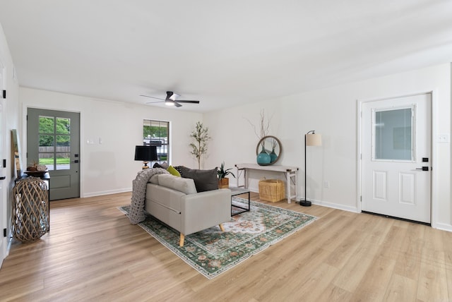 1495 Manor St, Conway, AR 72034 - living room featuring light wood-style flooring and ceiling fan
