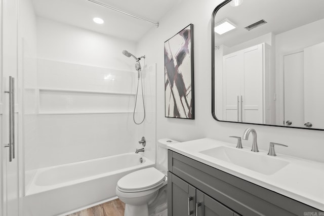 301 Kings Row Dr Unit 106, Little Rock, AR 72207 - full bathroom featuring vanity, washtub / shower combination, and wood finished floors
