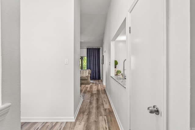 301 Kings Row Dr Unit 106, Little Rock, AR 72207 - corridor featuring light wood finished floors and baseboards
