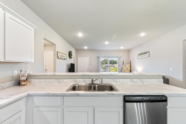 1040 Gallery Dr, Conway, AR 72032 - kitchen featuring stainless steel dishwasher, white cabinetry, recessed lighting, a peninsula, and light stone counters