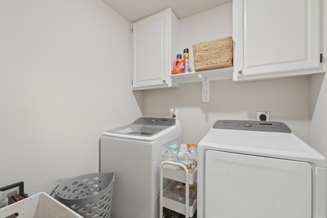 1040 Gallery Dr, Conway, AR 72032 - laundry room featuring cabinet space and washer and clothes dryer