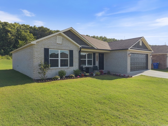 1040 Gallery Dr, Conway, AR 72032 - view of front facade with brick siding, a garage, concrete driveway, and a front lawn