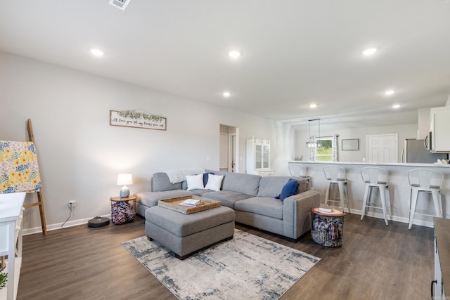 1040 Gallery Dr, Conway, AR 72032 - living area with dark wood-style floors and recessed lighting