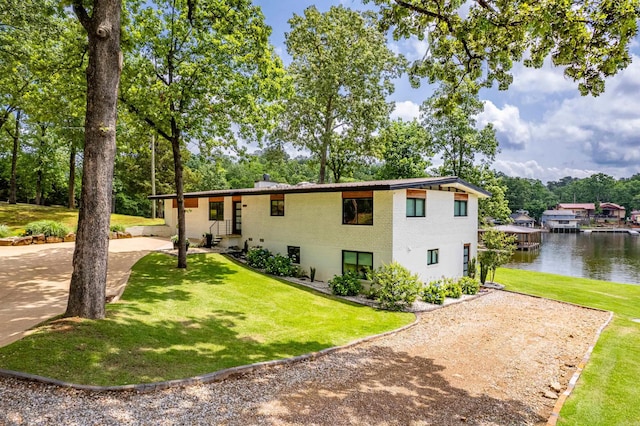 1113 Twin Points Rd, Hot Springs, AR 71913 - view of front of property with driveway, a water view, a front yard, and brick siding