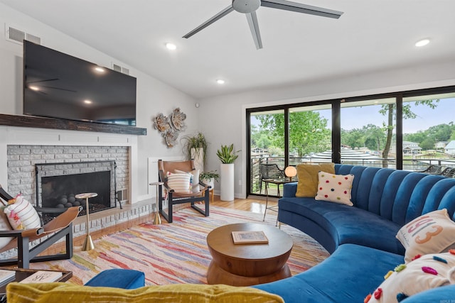 1113 Twin Points Rd, Hot Springs, AR 71913 - living area with wood finished floors, ceiling fan, a brick fireplace, and recessed lighting