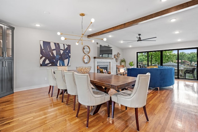 1113 Twin Points Rd, Hot Springs, AR 71913 - dining area with a fireplace, light wood-style floors, recessed lighting, and ceiling fan