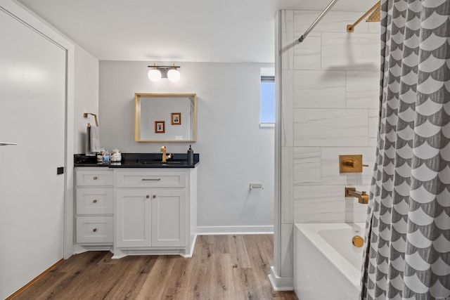 1113 Twin Points Rd, Hot Springs, AR 71913 - full bathroom with vanity, wood finished floors, and shower / bath combo