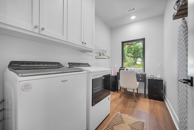 1113 Twin Points Rd, Hot Springs, AR 71913 - laundry area featuring cabinet space, independent washer and dryer, light wood-style flooring, and recessed lighting
