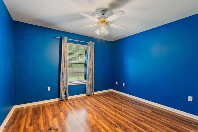 53 E Main St, Greenbrier, AR 72058 - unfurnished room with wood finished floors and ceiling fan