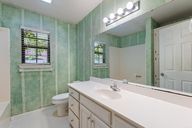 53 E Main St, Greenbrier, AR 72058 - bathroom with vanity, tile patterned floors, and a bathtub