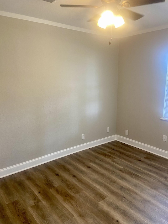 134 S Gosnell St, Gosnell, AR 72315 - empty room with ornamental molding, ceiling fan, and dark wood-style floors