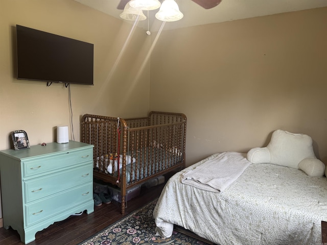 497 Ben Rd, Drasco, AR 72530 - bedroom with dark wood finished floors and ceiling fan