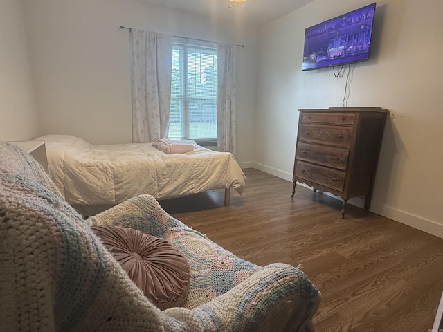 497 Ben Rd, Drasco, AR 72530 - bedroom with baseboards and wood finished floors