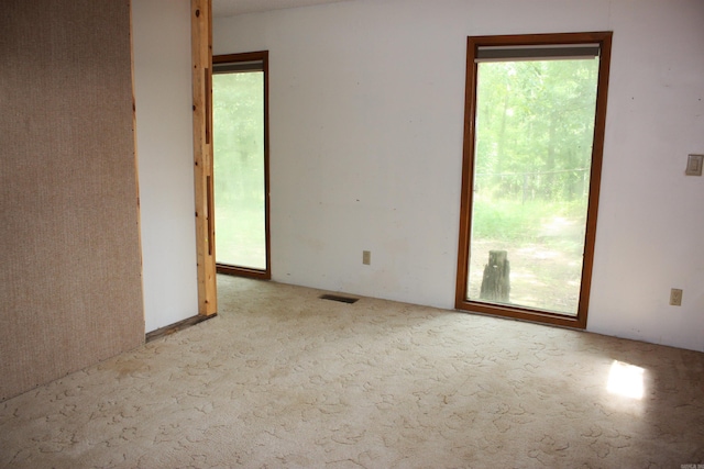 196 Stone Mountain Rd, Vilonia, AR 72032 - unfurnished room with carpet floors and plenty of natural light