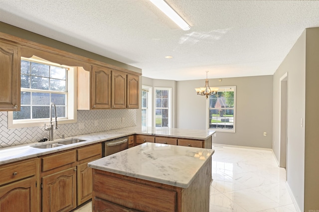 1900 Andy Cv, White Hall, AR 71602 - kitchen with light marble finish floors, a peninsula, decorative backsplash, dishwasher, and a textured ceiling