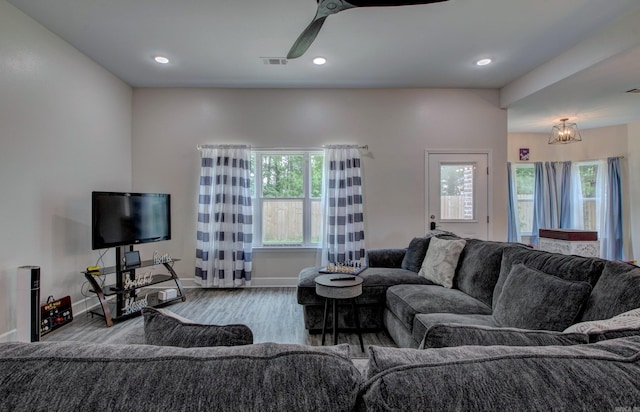226 Shamsie Ln, White Hall, AR 71602 - living room with plenty of natural light, wood finished floors, a chandelier, and recessed lighting