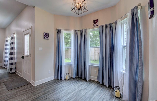 226 Shamsie Ln, White Hall, AR 71602 - empty room featuring wood finished floors and a chandelier