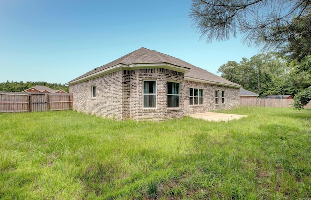226 Shamsie Ln, White Hall, AR 71602 - rear view of property with brick siding and a patio area