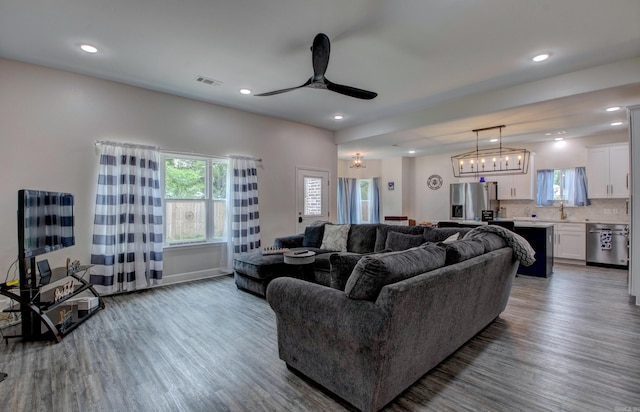226 Shamsie Ln, White Hall, AR 71602 - living area with wood finished floors, healthy amount of natural light, a ceiling fan, and recessed lighting