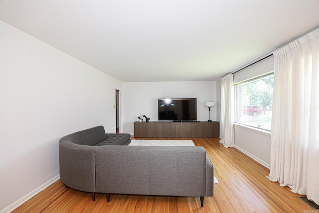 1913 Topf Rd, North Little Rock, AR 72116 - living room featuring light wood finished floors and baseboards