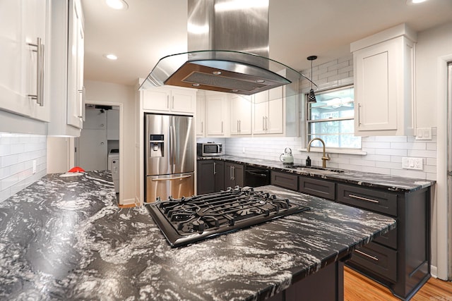 1913 Topf Rd, North Little Rock, AR 72116 - kitchen featuring stainless steel appliances, island exhaust hood, white cabinetry, dark stone countertops, and recessed lighting