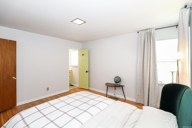 1913 Topf Rd, North Little Rock, AR 72116 - bedroom featuring wood finished floors and baseboards