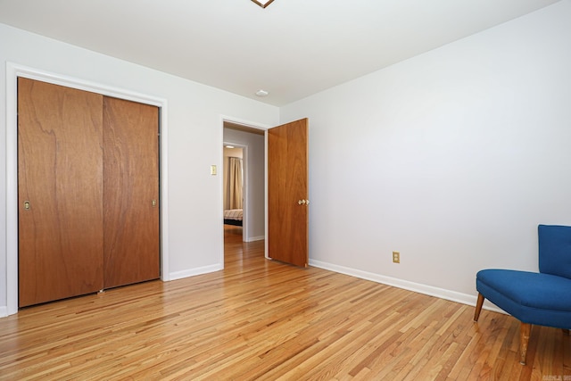 1913 Topf Rd, North Little Rock, AR 72116 - unfurnished bedroom with light wood-style flooring and a closet