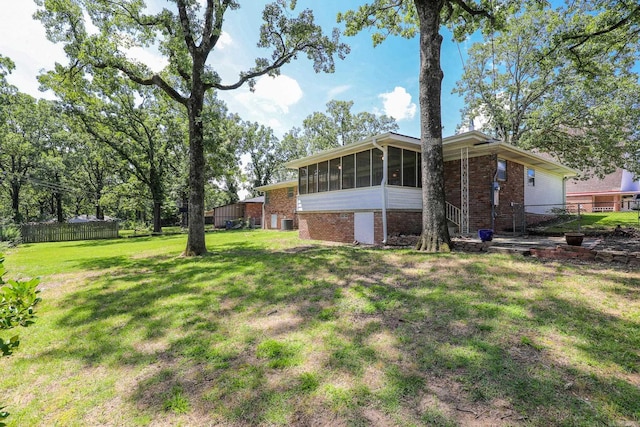 1913 Topf Rd, North Little Rock, AR 72116 - view of yard with a sunroom