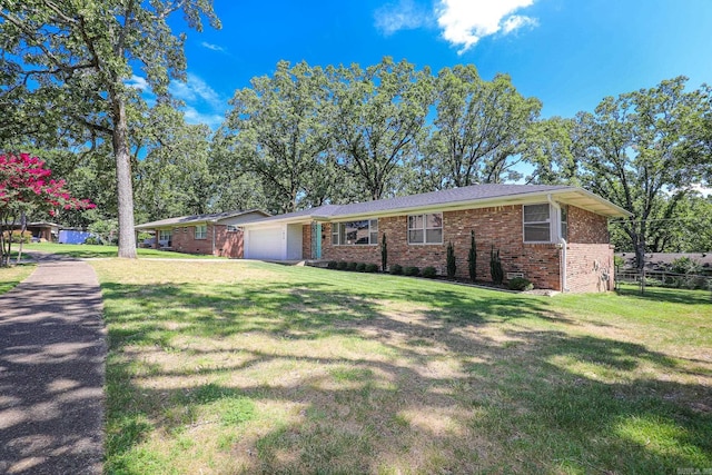 1913 Topf Rd, North Little Rock, AR 72116 - single story home with brick siding and an attached garage