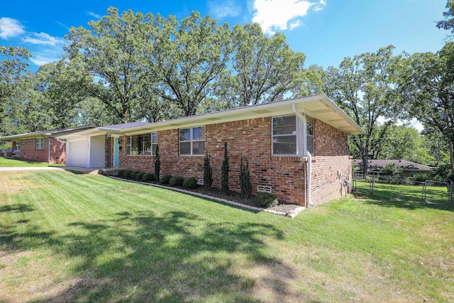 1913 Topf Rd, North Little Rock, AR 72116 - view of front facade featuring brick siding and an attached garage