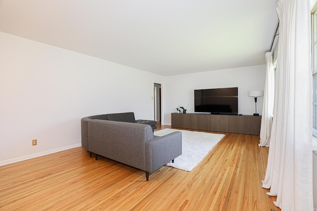 1913 Topf Rd, North Little Rock, AR 72116 - living room featuring light wood-type flooring and baseboards
