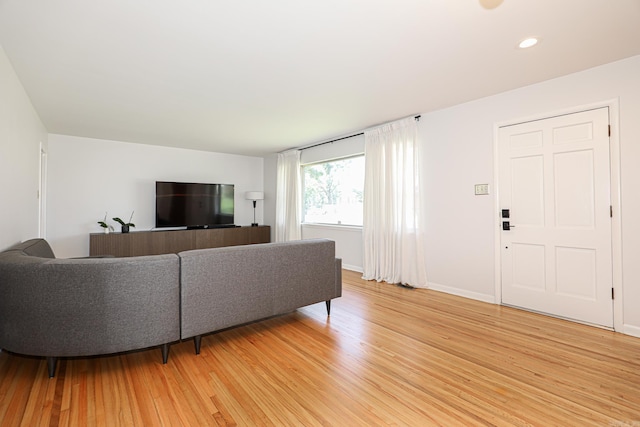 1913 Topf Rd, North Little Rock, AR 72116 - living area with light wood-style floors and recessed lighting