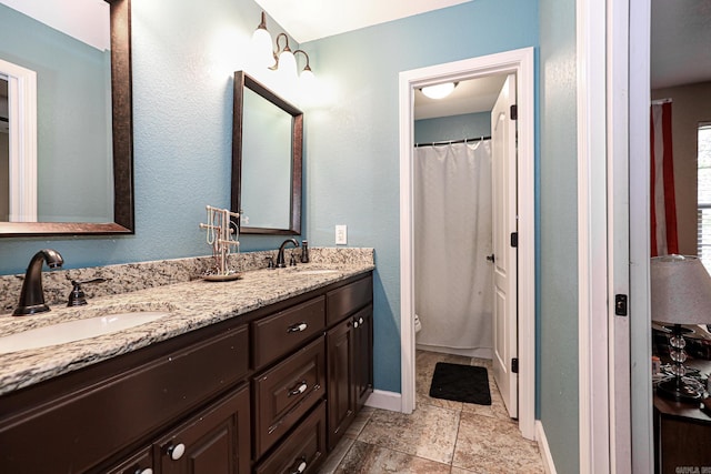 506 Scarlet Oaks Cv, Benton, AR 72019 - full bath with double vanity and curtained shower