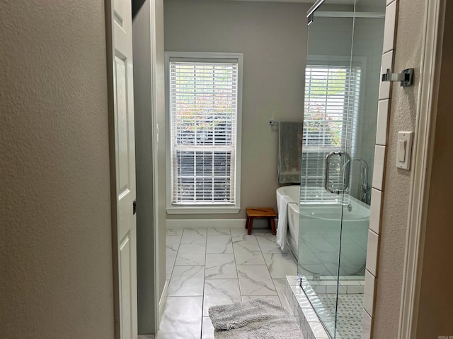 3 Timber Ridge Cir, Arkadelphia, AR 71923 - full bath with marble finish flooring, a freestanding bath, a shower stall, and a textured wall