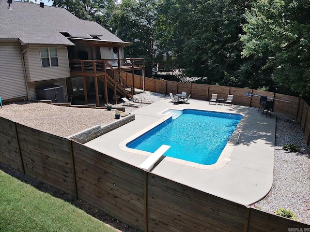 3 Timber Ridge Cir, Arkadelphia, AR 71923 - view of swimming pool featuring stairs, a deck, a patio area, a fenced backyard, and a diving board