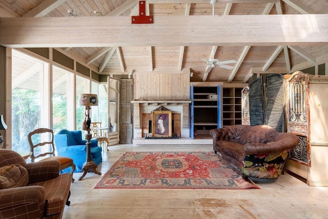 1032 Nunis Dr, Heber Springs, AR 72543 - living room featuring wooden ceiling, a ceiling fan, and wood-type flooring