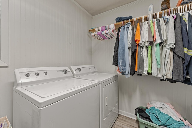 508 Cindy St, Paragould, AR 72450 - laundry room featuring independent washer and dryer, ornamental molding, and light wood finished floors