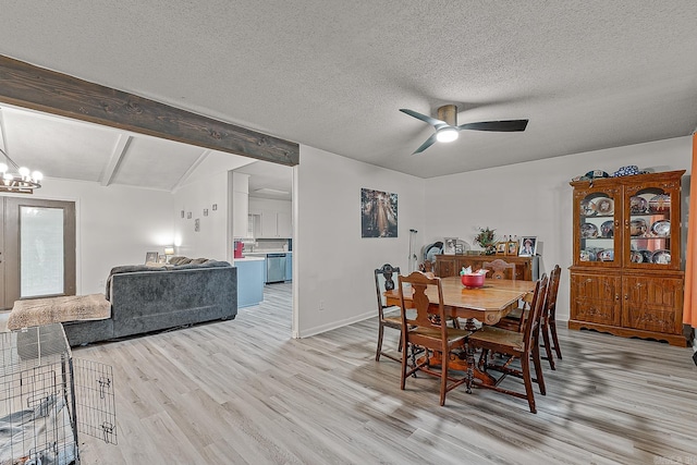 508 Cindy St, Paragould, AR 72450 - dining space with light wood finished floors, ceiling fan, a chandelier, and a textured ceiling