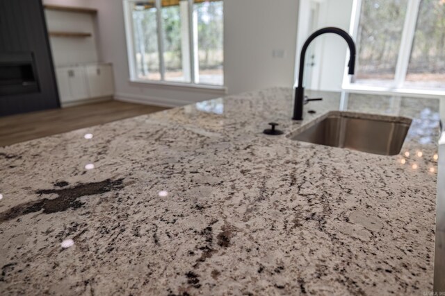 60 Estrella Way, Hot Springs Village, AR 71909 - kitchen featuring a sink and light stone countertops
