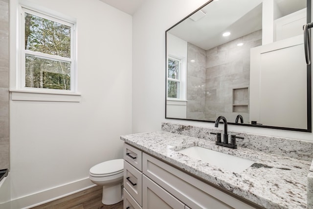 60 Estrella Way, Hot Springs Village, AR 71909 - full bath with wood finished floors, vanity, healthy amount of natural light, and a shower