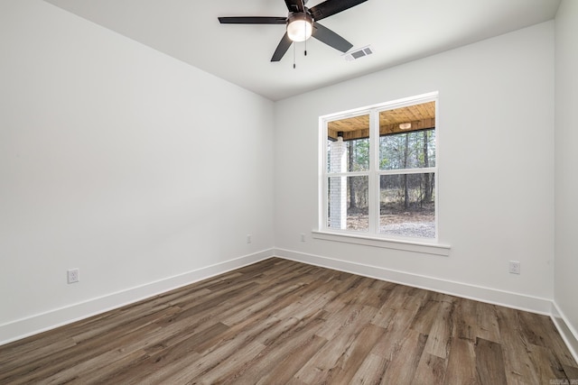 60 Estrella Way, Hot Springs Village, AR 71909 - unfurnished room with wood finished floors and a ceiling fan