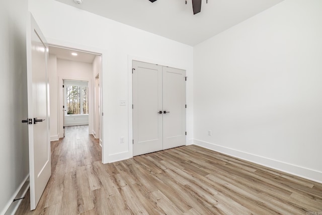 60 Estrella Way, Hot Springs Village, AR 71909 - unfurnished bedroom with light wood finished floors and a closet