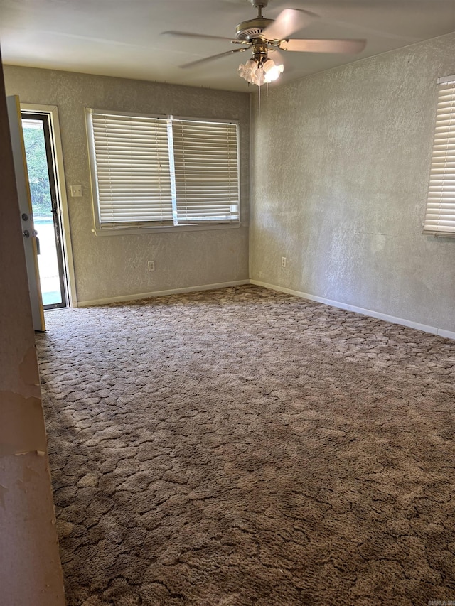 513 Joyce, Searcy, AR 72143 - spare room with a ceiling fan, carpet flooring, and a textured wall