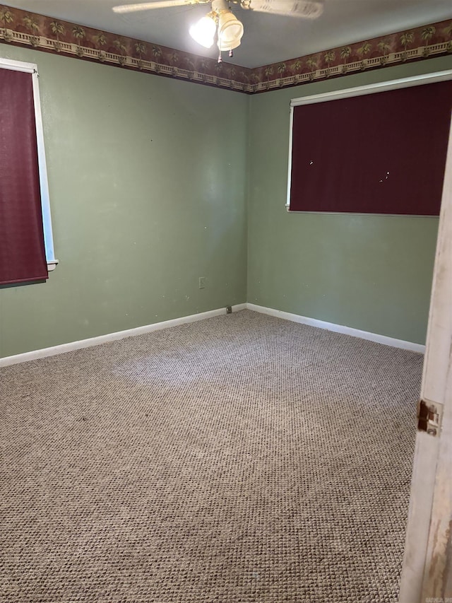 513 Joyce, Searcy, AR 72143 - carpeted empty room featuring ceiling fan and baseboards